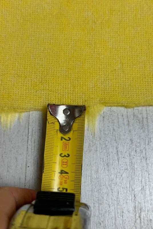 Coupon tissu fausse fourrure douce et légère jaune à poils mi-longs 30cm x 155cm