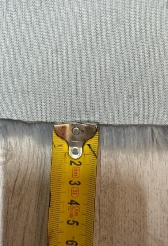 Coupon tissu fausse fourrure douce de qualité bleu clair à poils mi-longs 32cmx78cm