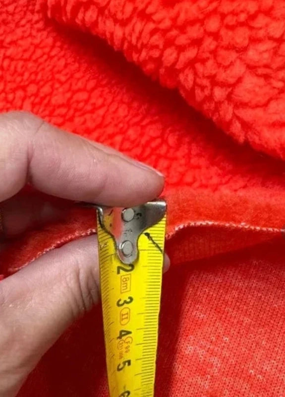 Coupon tissu fausse fourrure douce moutonnée à poils mi-longs orange 30cm x 160cm