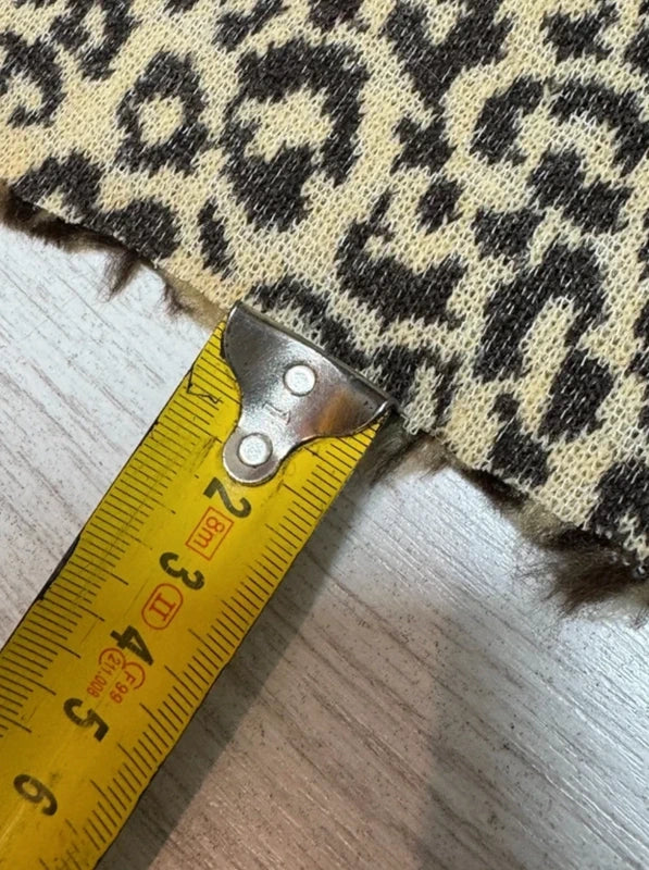 Coupon tissu fausse fourrure douce et légère à poils mi-longs imprimée marron et beige 30cm x 153cm