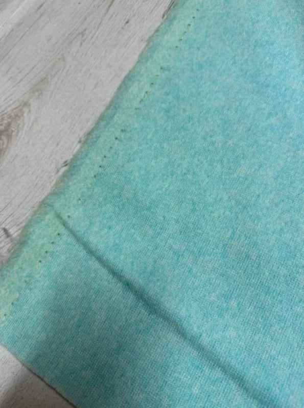 Coupon tissu fausse fourrure légère à poils courts bleu turquoise 30cmx152cm