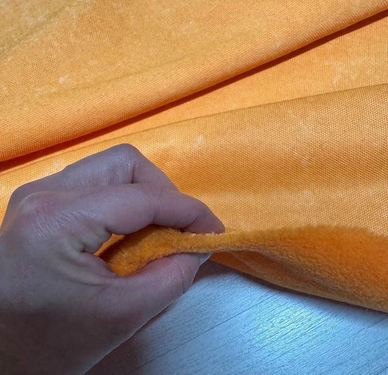 Coupon fausse fourrure légère touché polaire à poils courts orange 30cmx160cm