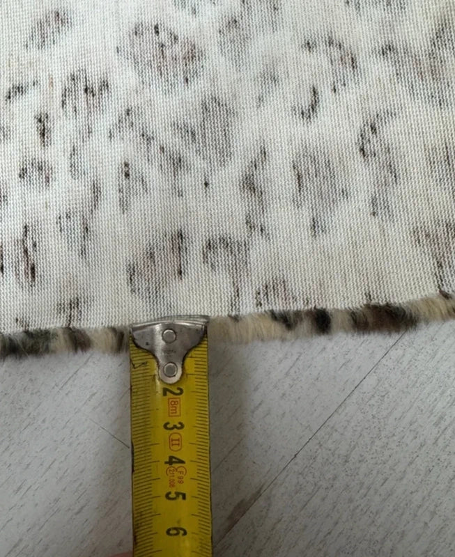 Coupon tissu fausse fourrure de qualité imprimée beige marron à poils mi-longs 20cm x 156cm