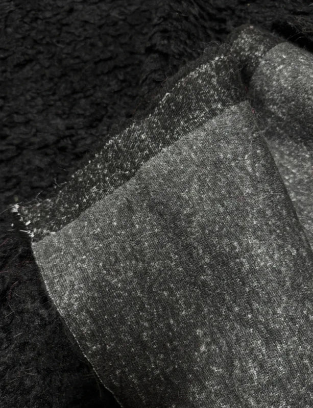 Coupon fausse fourrure douce et légère à poils longs et frisés bouclés noir 30cm x 135cm