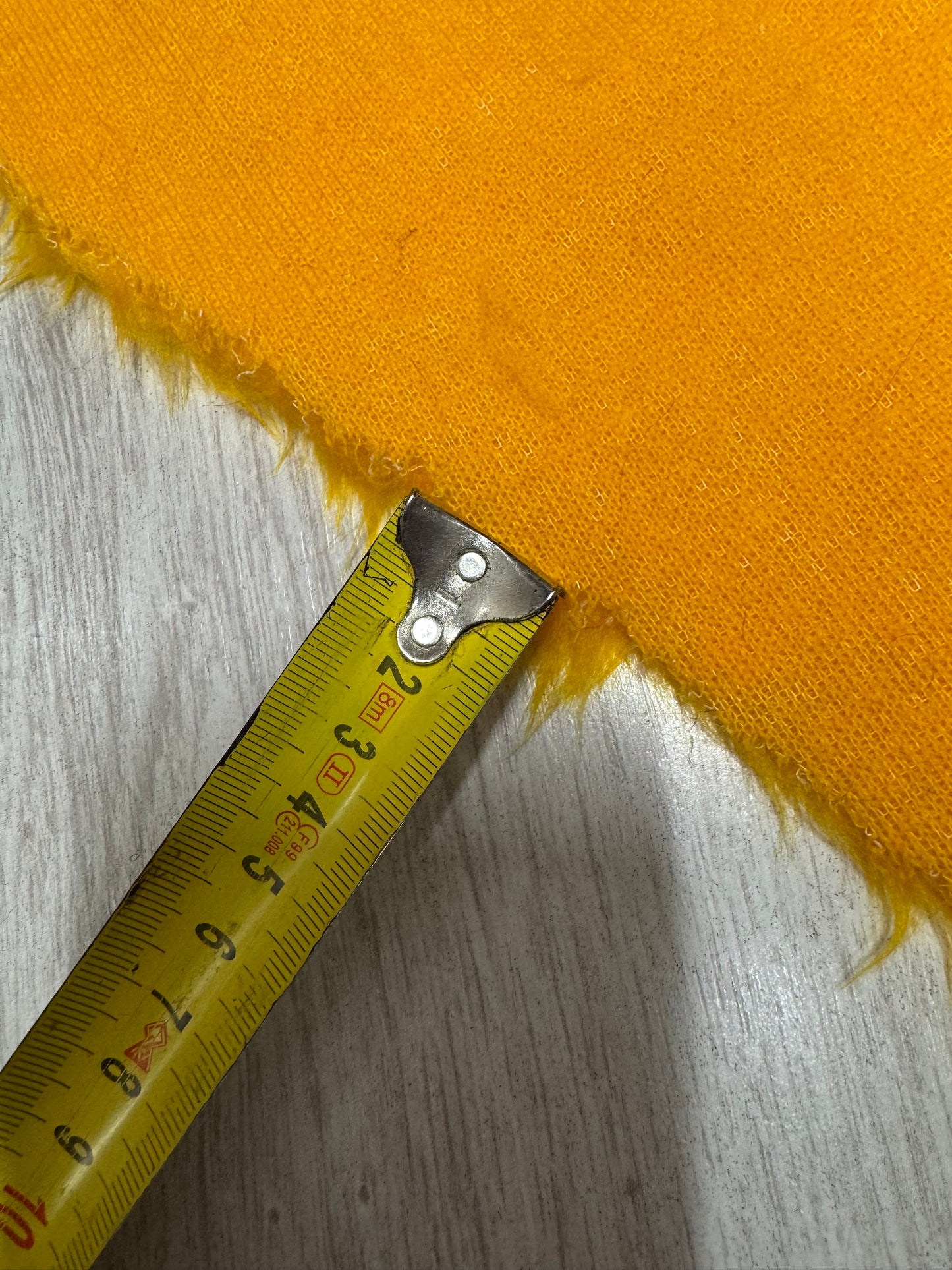 Coupon tissu fausse fourrure douce légère à poils courts orange 30cmx54cm