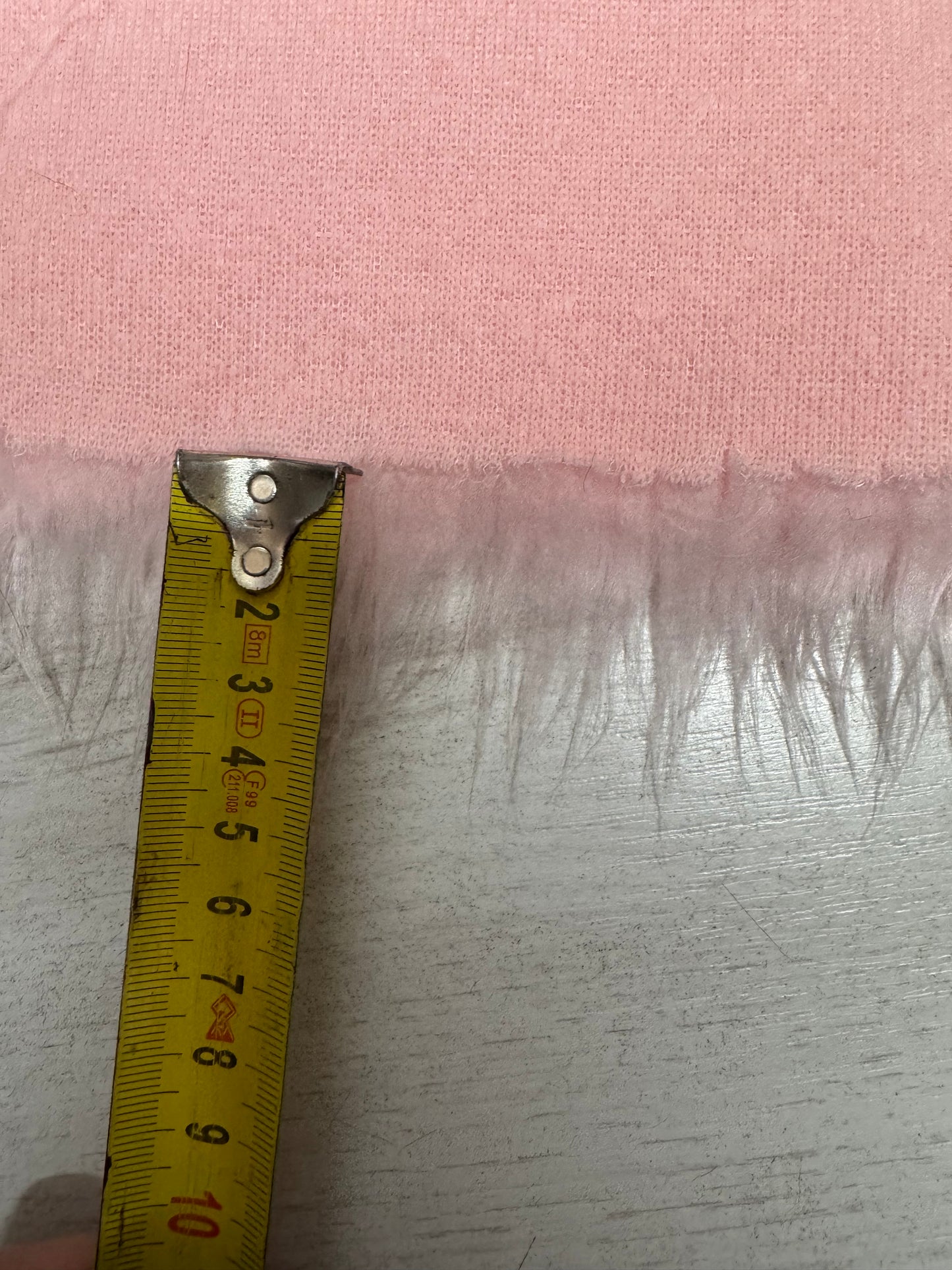 Coupon fausse fourrure rose poils longs 3 cm – 30x152 cm