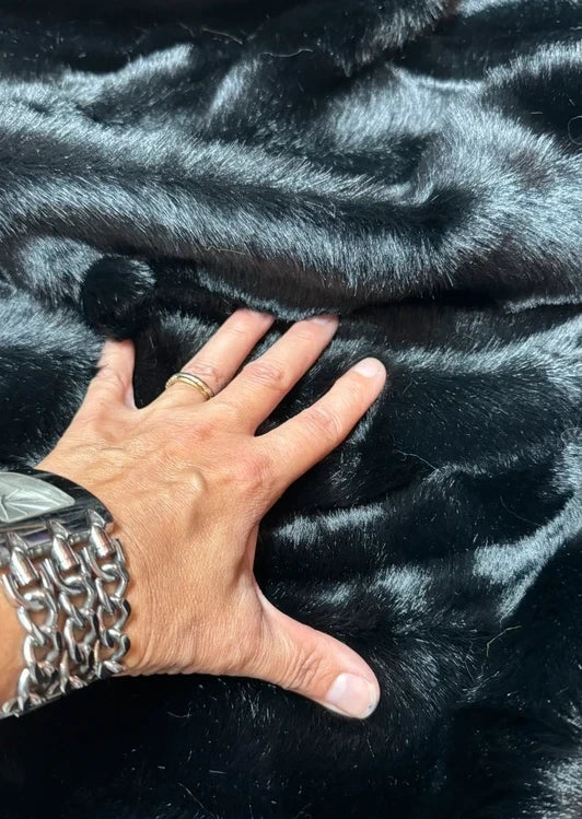 Soft, textured, high-quality black faux fur fabric piece, medium pile, 43cm x 106cm