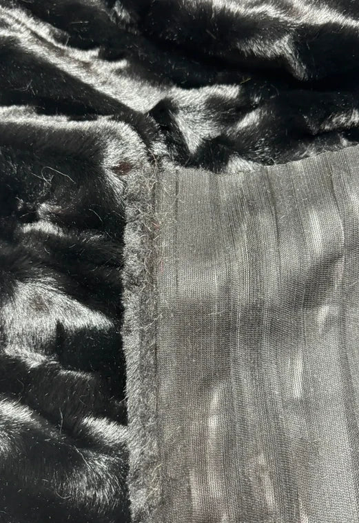 Soft, textured, high-quality black faux fur fabric piece, medium pile, 43cm x 106cm