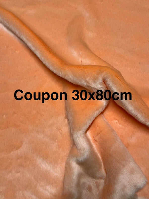 Coupon tissu fausse fourrure à poils mi-longs corail 30cmx80cm