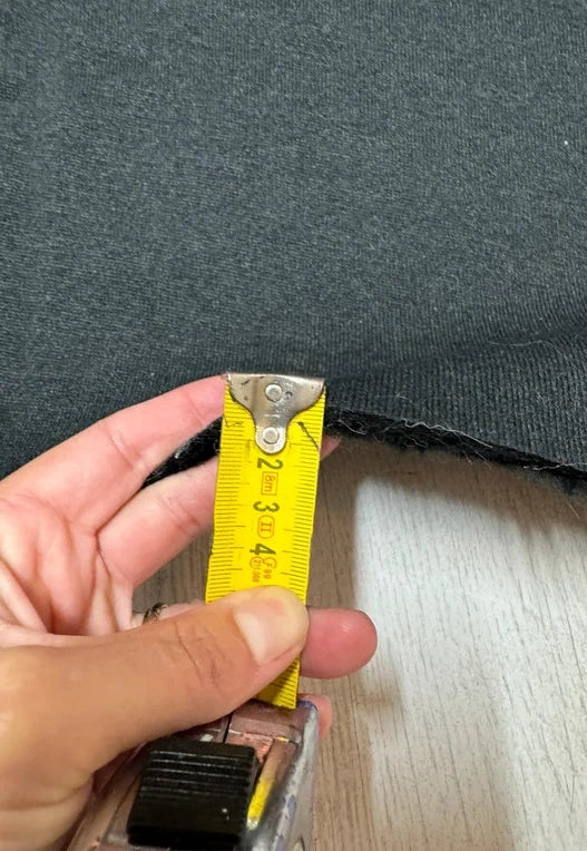 Coupon tissu fausse fourrure douce légère à poils mi-longs noir 30cmx78cm