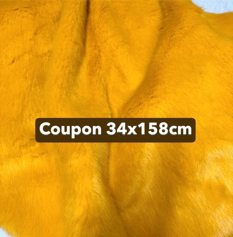 Coupon tissu fausse fourrure douce et épaisse jaune orange à poils mi-longs 34cm x 158cm