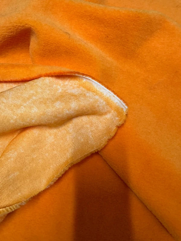 Coupon tissu fausse fourrure légère touché polaire à poils courts orange 50cmx50cm