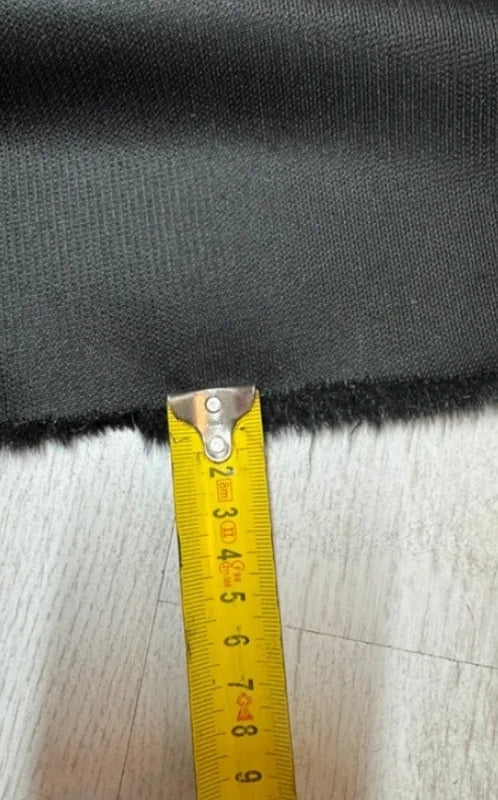 Coupon tissu fausse fourrure douce à poils mi-longs noir 30cmx84cm