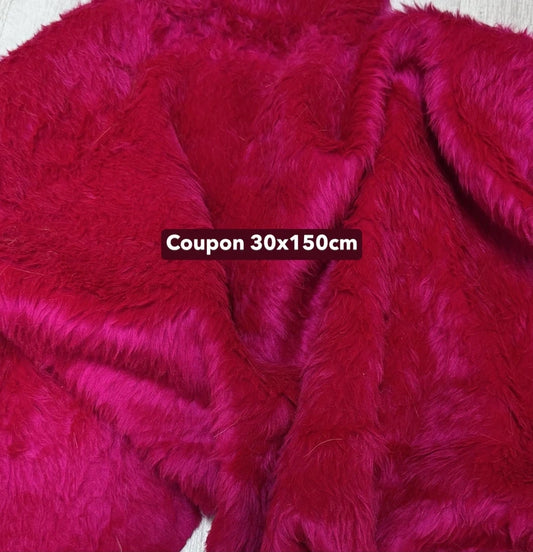 Coupon tissu fausse fourrure douce et légère rose fuchsia à poils mi-longs 30cm x 150cm