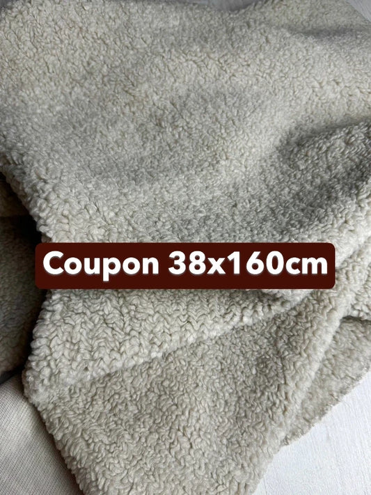 Coupon tissu très doux fausse fourrure à poils frisés beige grisonnant 38cm x 160cm