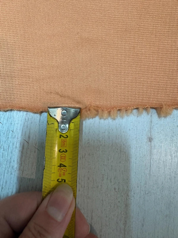 Coupon tissu fausse fourrure douce et légère orange abricot à poils courts 30cm x 155cm