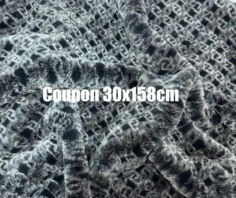 Coupon tissu fausse fourrure très douce imprimée noir et blanc à poils mi-longs 30cmx158cm