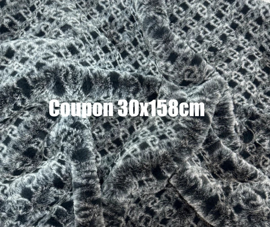 Coupon tissu fausse fourrure très douce imprimée noir et blanc à poils mi-longs 30cmx158cm