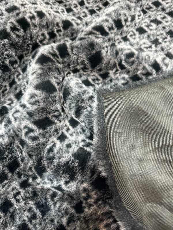 Coupon tissu fausse fourrure très douce imprimée noir et blanc à poils mi-longs 30cmx158cm