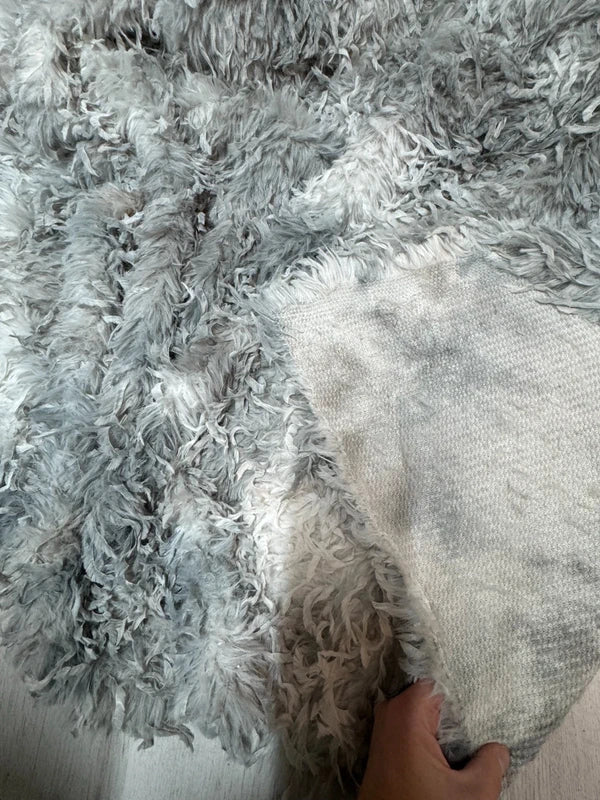 Soft faux fur fabric remnant with long grey-white feather effect pile 30cm x 160cm