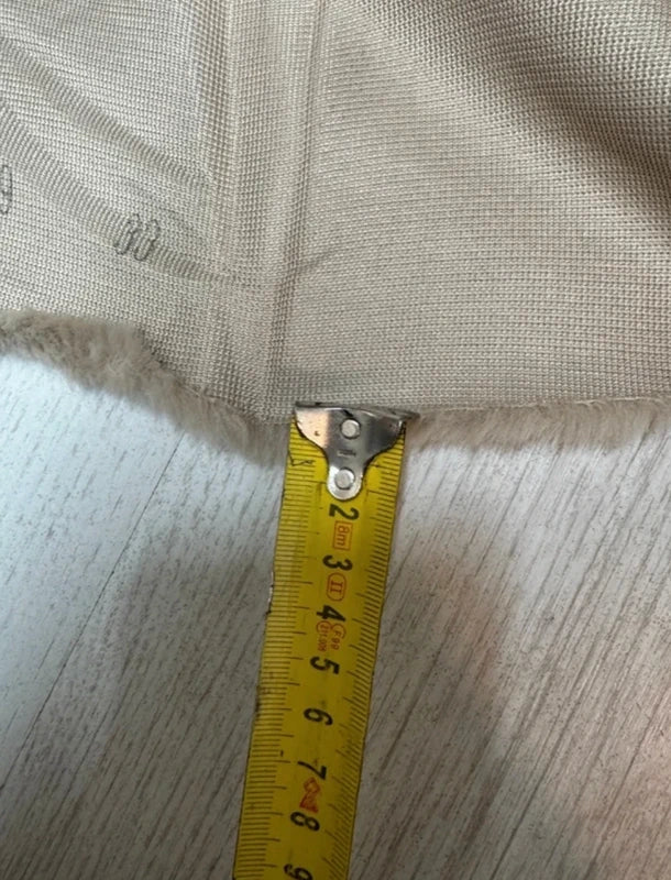 Coupon tissu fausse fourrure douce beige à poils mi-longs 30cm x 150cm