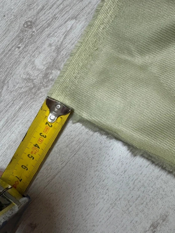 Coupon tissu fausse fourrure douce à poils courts vert amande 30cmx156cm