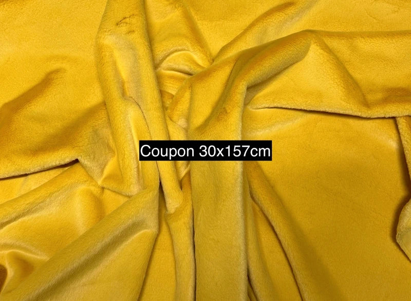 Coupon tissu fausse fourrure douce jaune orange à poils mi-longs 30cm x 157cm