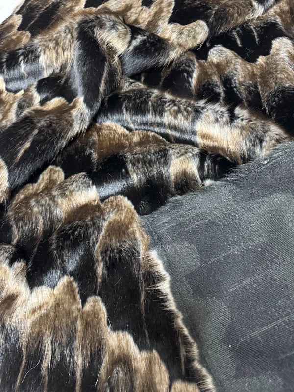 Coupon tissu fausse fourrure originale à poils mi-longs noir marron 30cm x 100cm