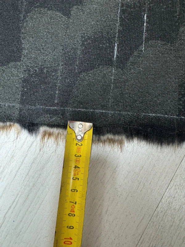 Coupon tissu fausse fourrure originale à poils mi-longs noir marron 30cm x 100cm