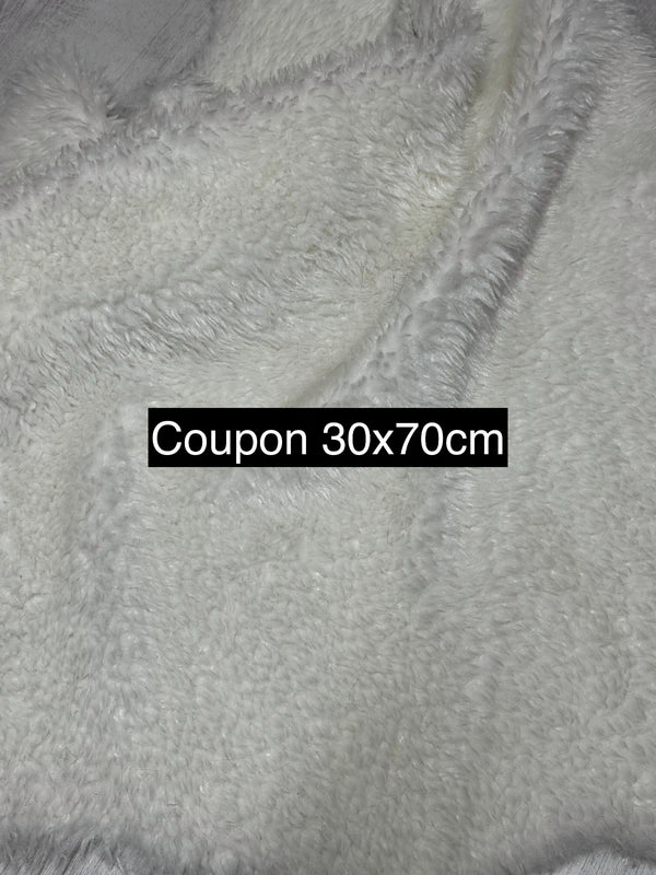 Coupon tissu fausse fourrure douce à poils mi-longs frisés blanc 30cm x 70cm