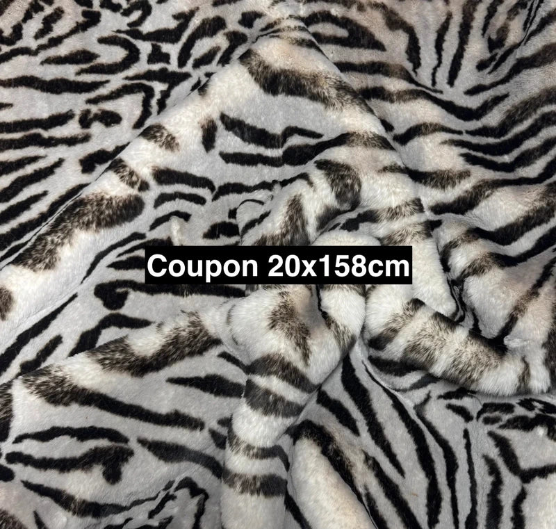Fausse fourrure zébrée noir & blanc poils mi-longs 2,5 cm – Coupon 20×158 cm