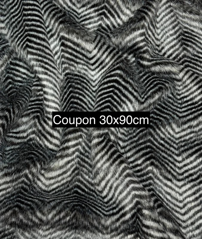 Fausse fourrure gris et noir poils longs effet chevrons – Coupon 30x90 cm