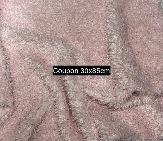 Coupon tissu fausse fourrure douce à poils mi-longs frisé rose clair 30cmx85cm