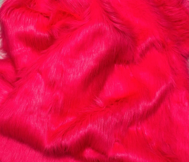 Coupon tissu fausse fourrure légère à poils longs rose fluo 14cm x 160cm