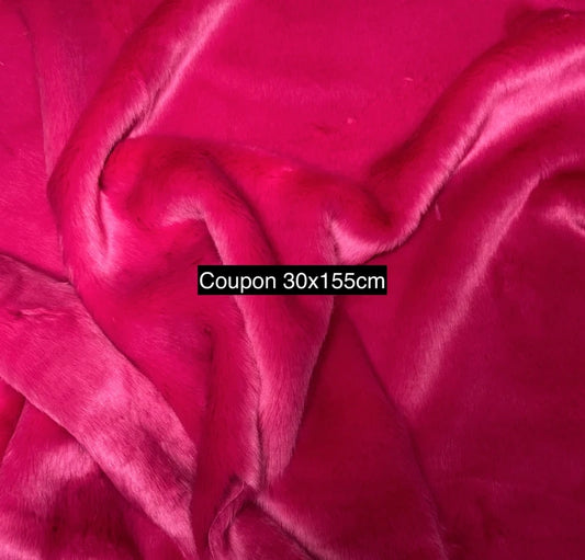 Coupon fausse fourrure douce et épaisse à poils mi-longs rose fuchsia 30cm x 155cm