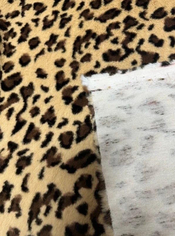 Coupon tissu fausse fourrure de qualité imprimée beige marron à poils mi-longs 20cm x 156cm