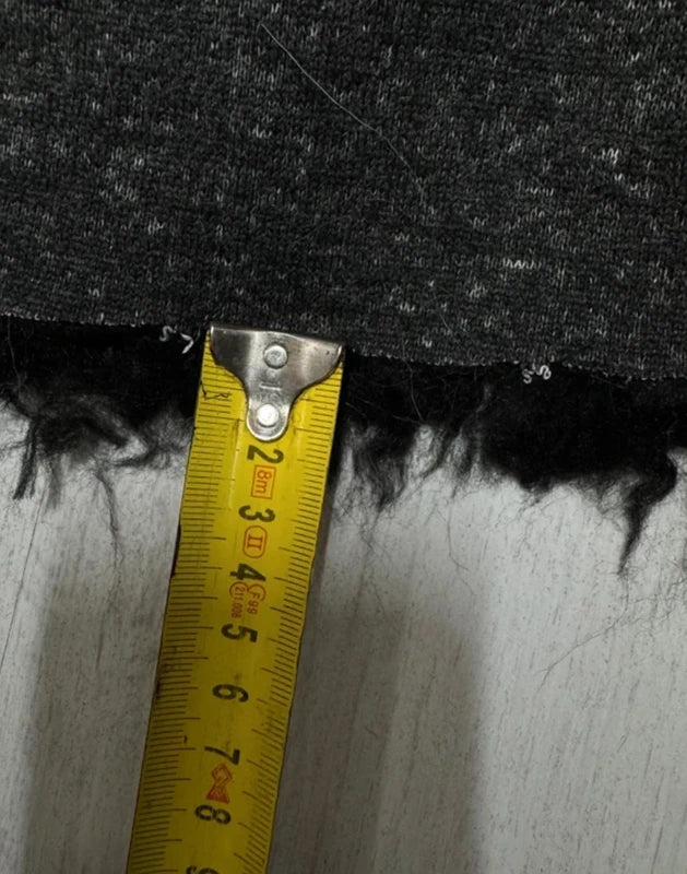 Coupon fausse fourrure douce et légère à poils longs et frisés bouclés noir 30cm x 135cm