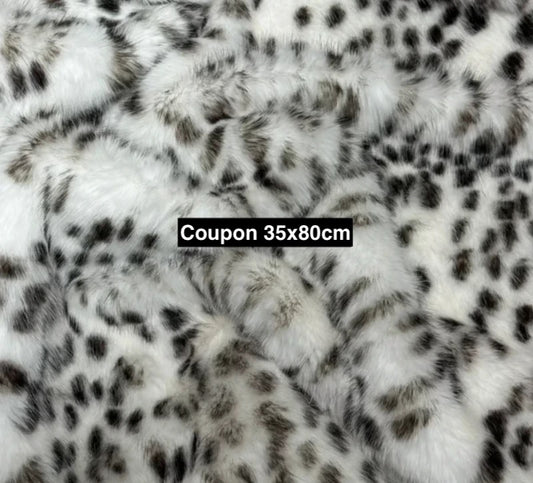 Coupon fausse fourrure noir/blanc 35x80 cm – poils 2 cm – motif tacheté