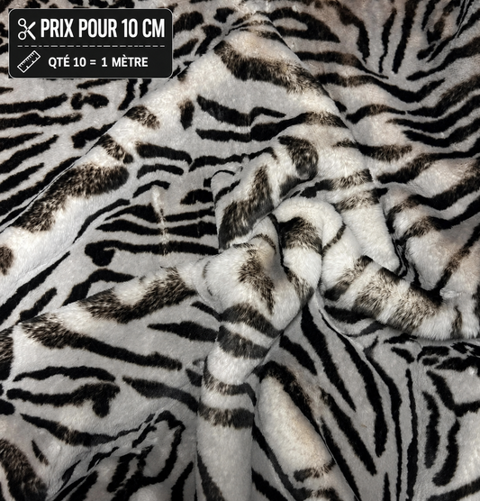 Fausse fourrure zèbre noir et blanc poils 2,5 cm vendue à la coupe pour couture créative