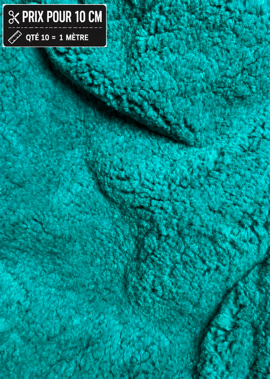 Fausse fourrure vert émeraude épaisse et douce à poils 2 cm vendue à la coupe