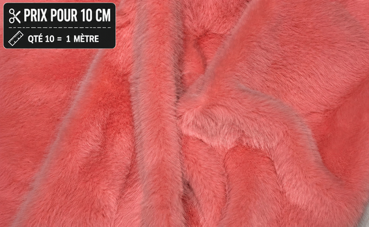 Fausse fourrure rose corail à poils de 2 cm largeur 140 cm