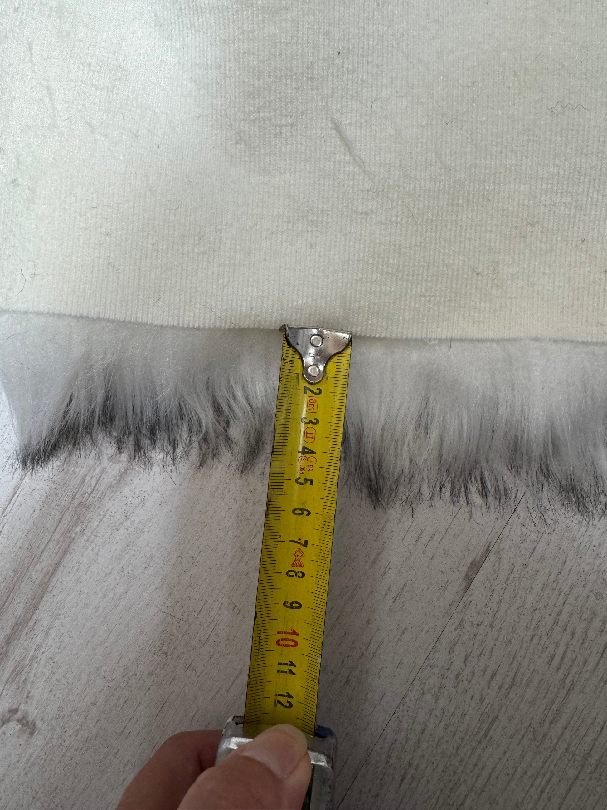 Tissu fausse fourrure blanc et noir pour couture créative