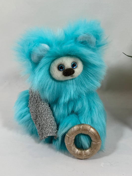 Frimousse Lagon ours de collection bleu turquoise avec bouée et serviette de plage