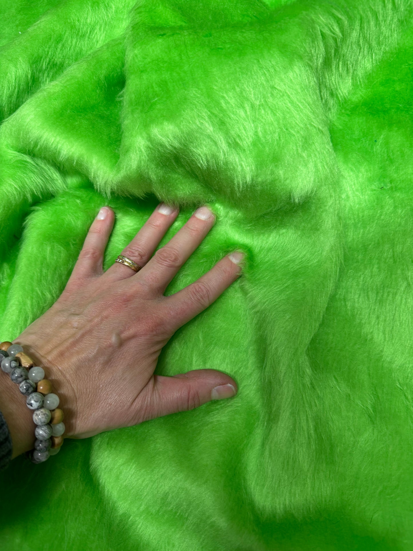 Apple green lightweight faux fur fabric remnant with medium-length pile 20cmx150cm