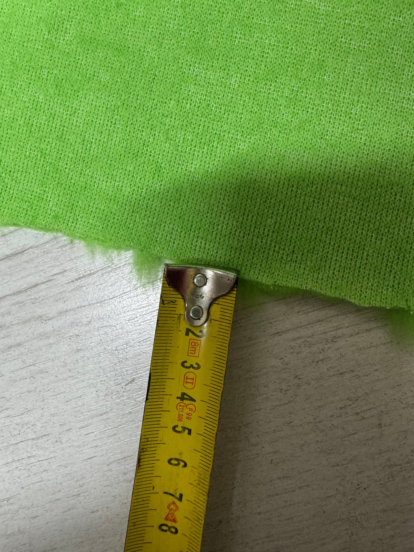 Apple green lightweight faux fur fabric remnant with medium-length pile 20cmx150cm