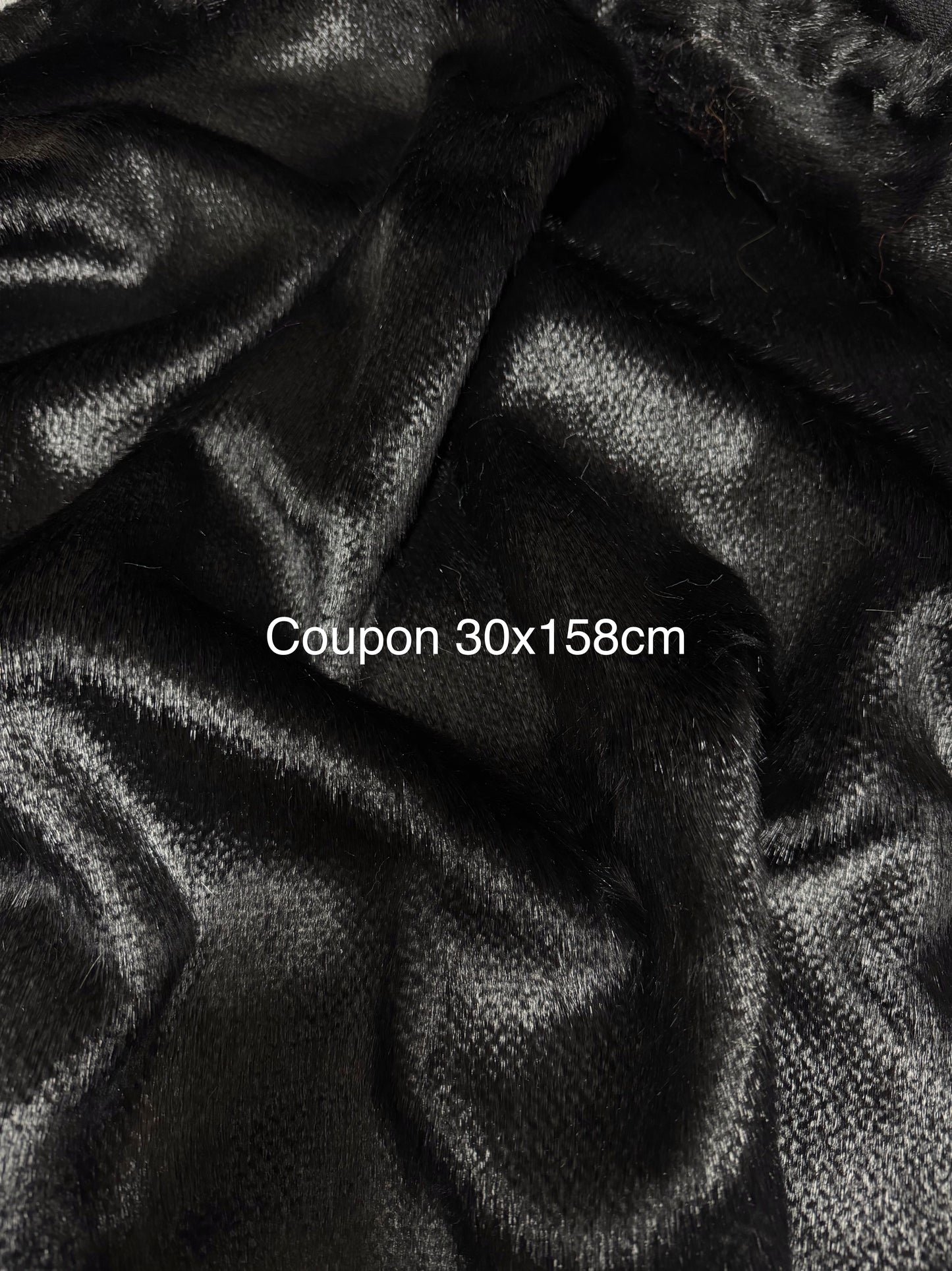 Coupon tissu fausse fourrure texturée douce et légère à poils courts noir 30cm x 158cm