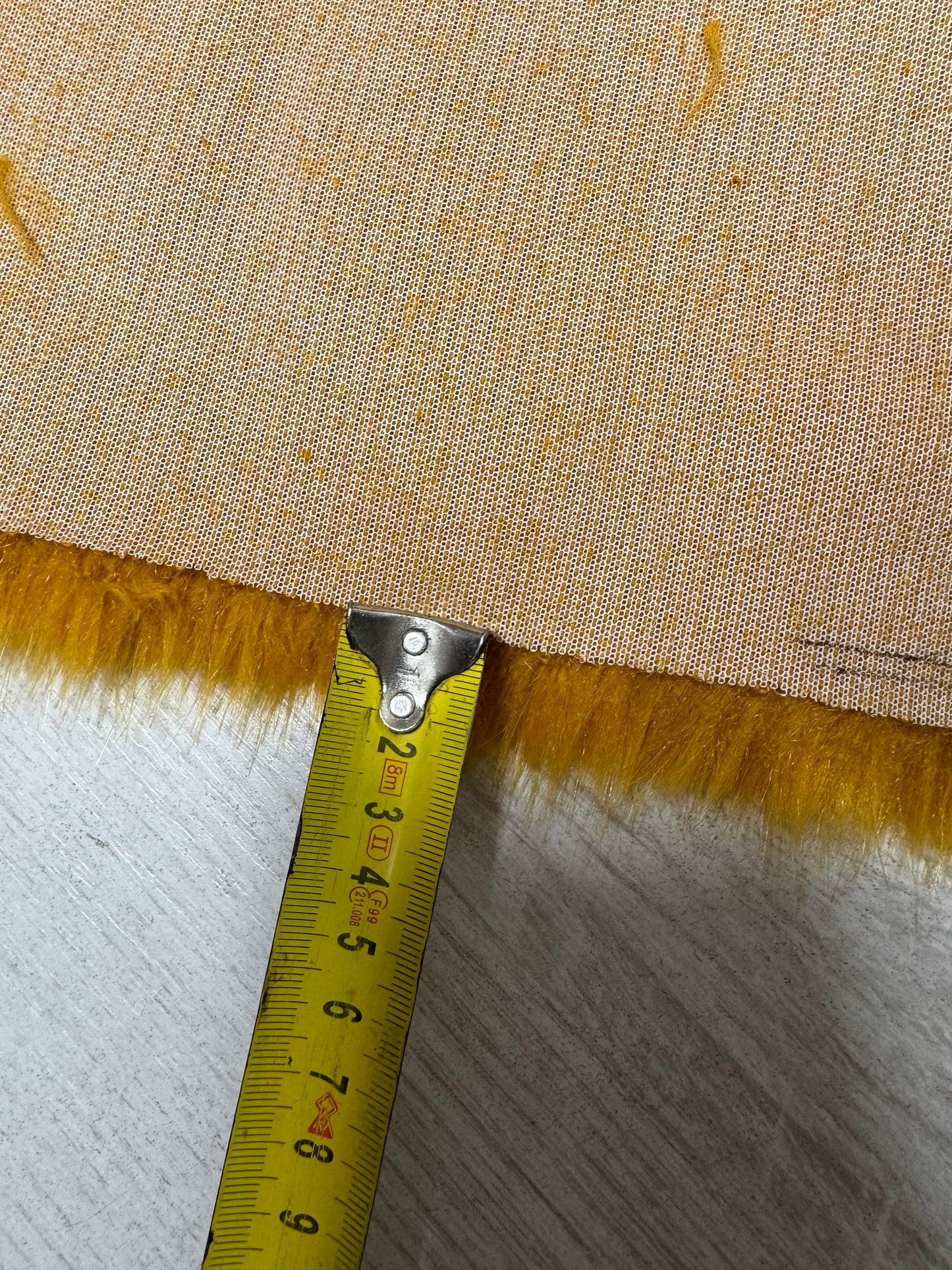 Coupon fausse fourrure orange roux – poils 2 cm – 30x172 cm