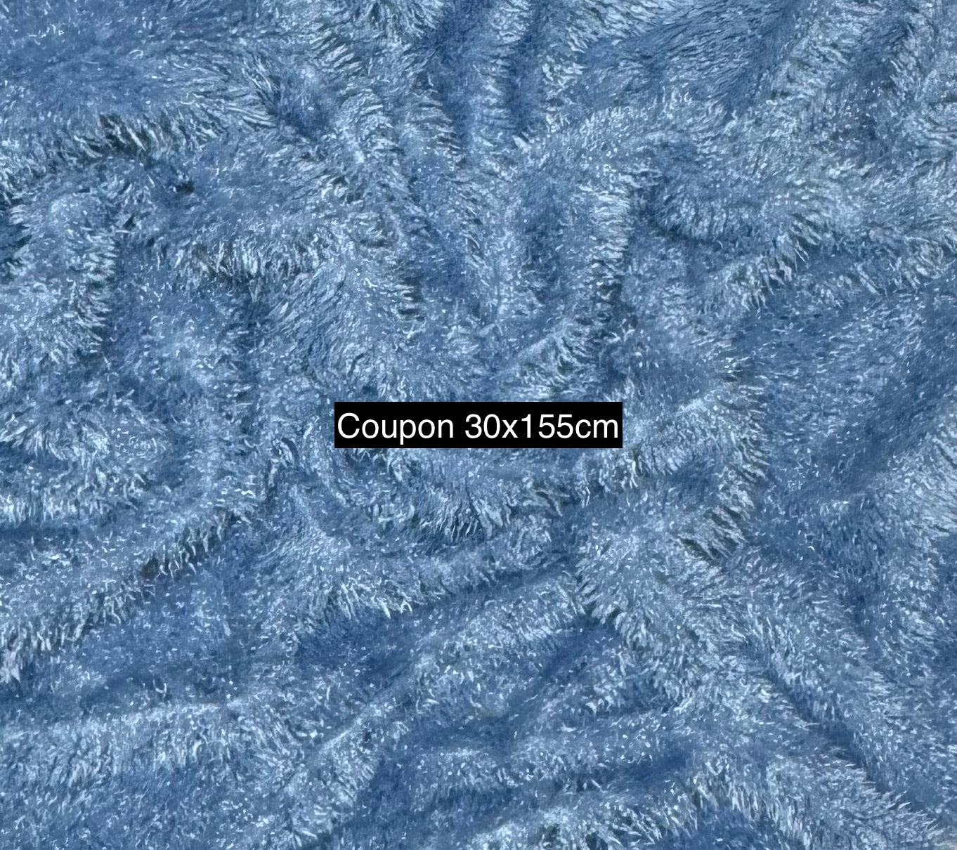 Coupon fausse fourrure bleu 30x155 cm – poils 2 cm – tissu souple couture