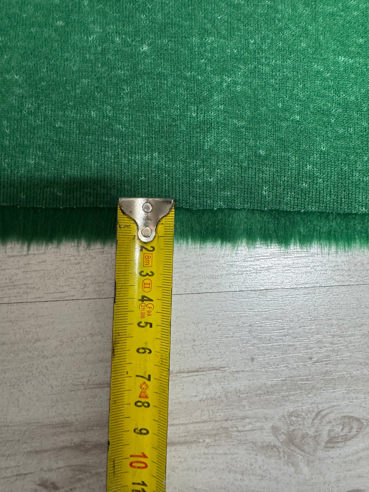 Coupon fausse fourrure vert émeraude poils 2 cm – 30x158 cm