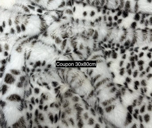 Coupon fausse fourrure noir/blanc 30x80 cm – poils 2 cm – motif tacheté